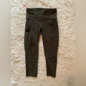 Dark green cropped lululemon leggings